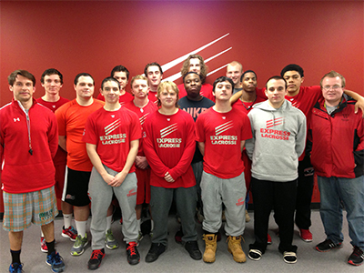 Members of the men's lacrosse team at Wells College pose for a team picture after shaving their faces in advance of "Mustache March" in late February. (Courtesy)