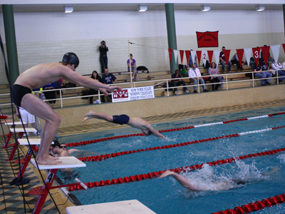 MEN'S SWIMMING SECOND AFTER DAY ONE OF CHAMPIONSHIP